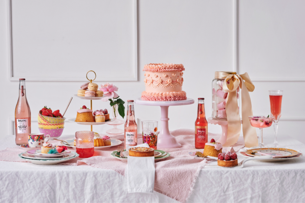 brunch spread with cake, spritzers and brutal fruit, the suite, the suite edit, entertaining, hosting, table decorating ideas